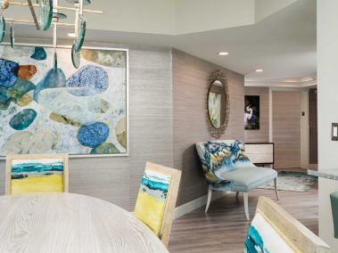 An open floorplan entryway with various oceanic decorations