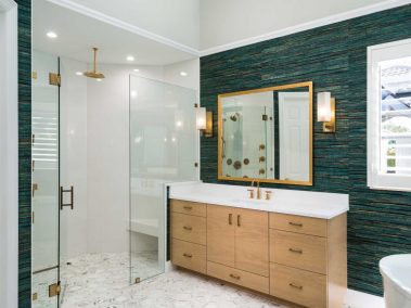 Full master bathroom with walk-in shower, bathtub, and sink