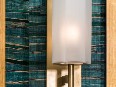 Ornate, wall-mounted bath lighting